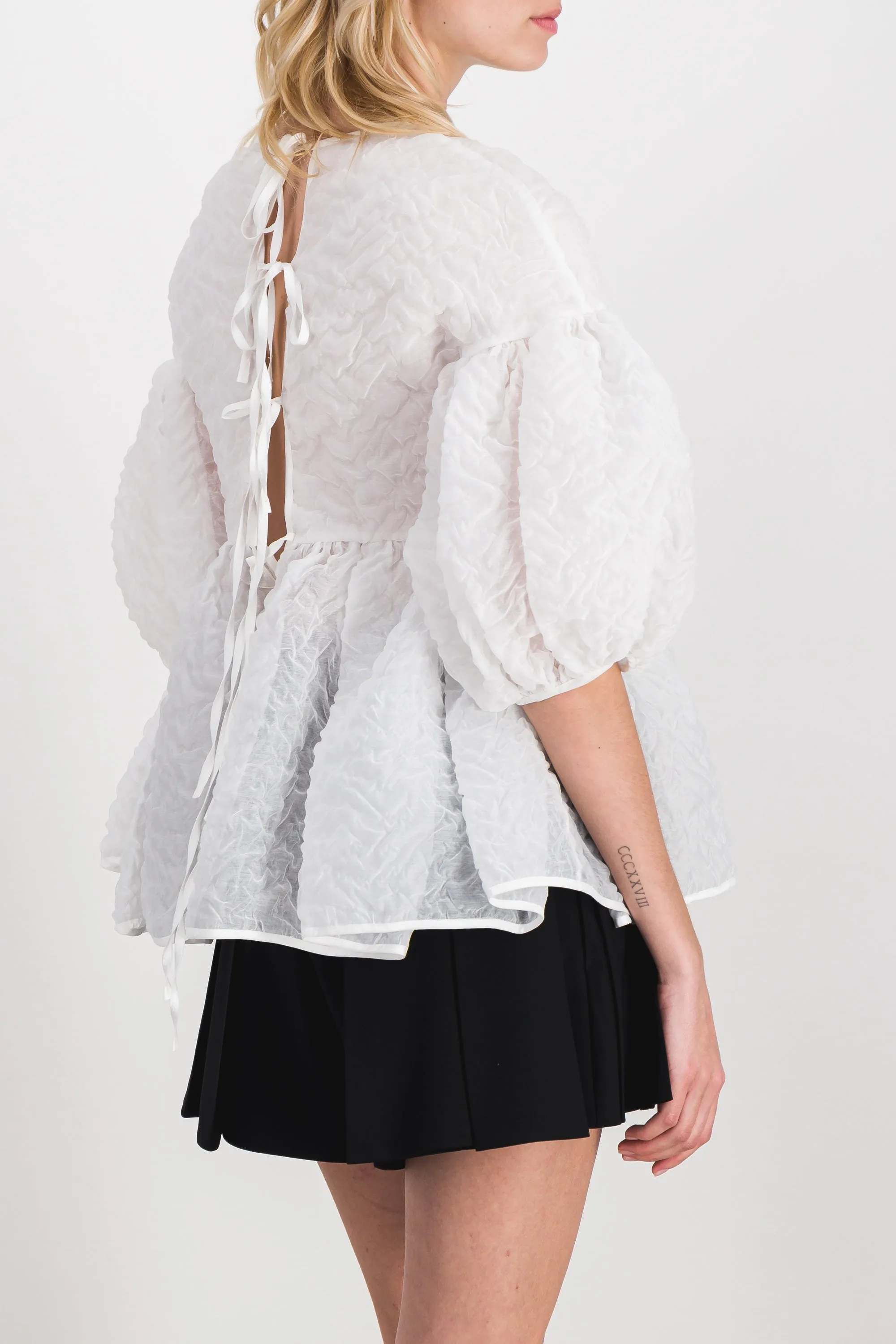 Matelassé drop shoulder top with puff sleeves