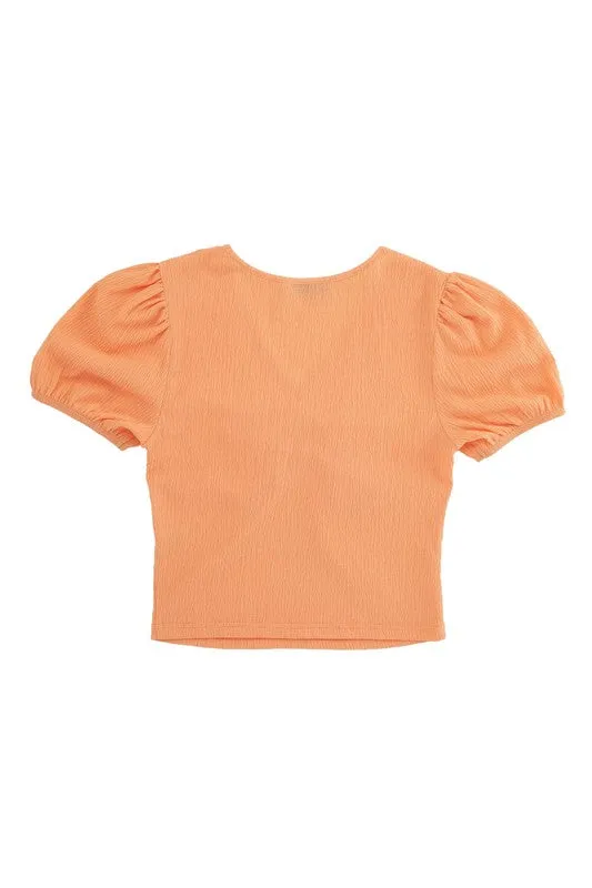 Shirred V neck top with puff sleeves